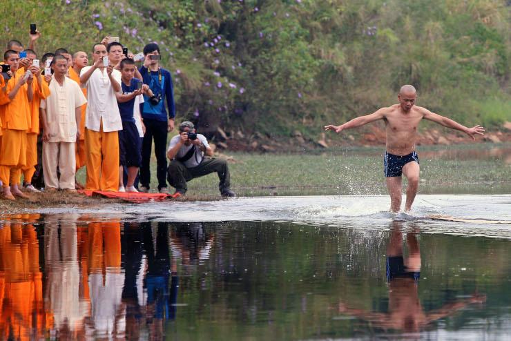 Shaolin Monks walking on water
